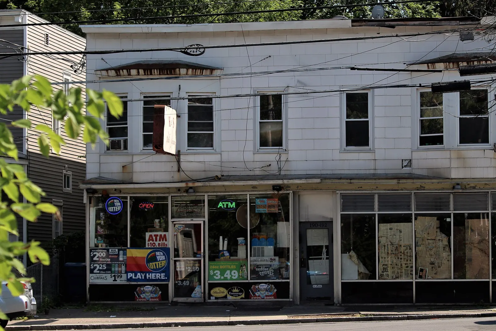 Bodega storefront on 2nd Avenue in Albany, New York, photographed in 2021